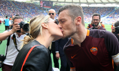 Ilary Blasi e Francesco Totti che si baciano